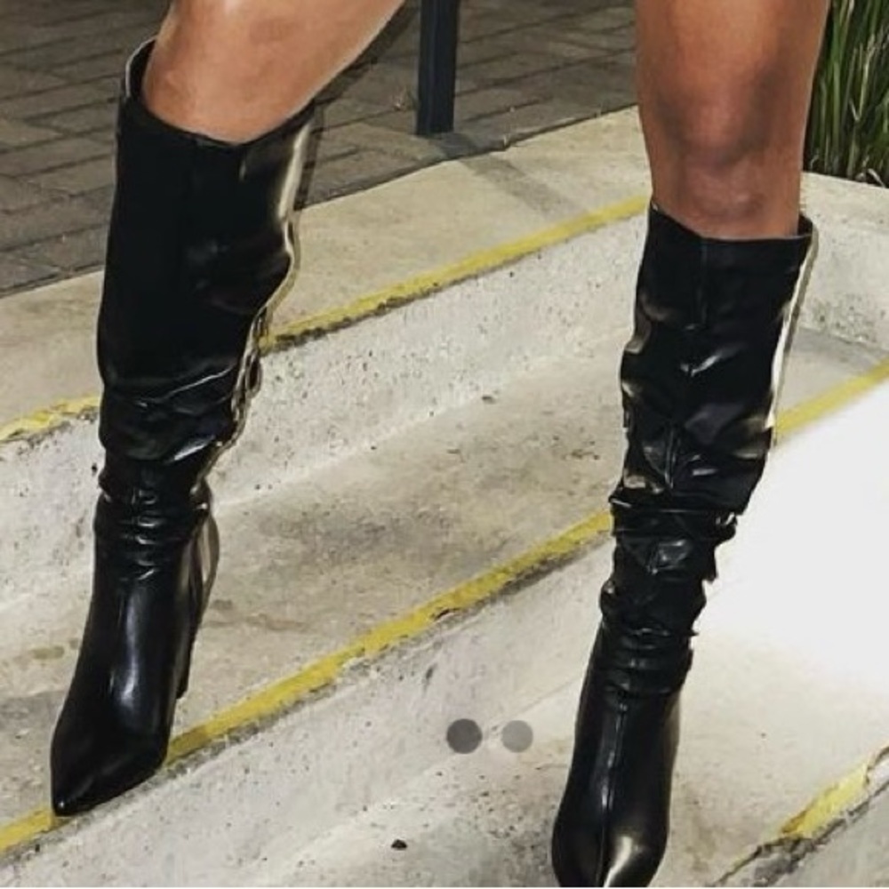 Black knee high pointed toe boots